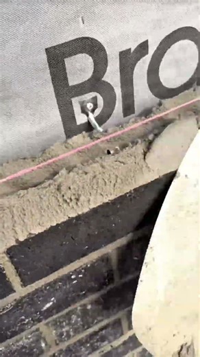 Spread the cement mixture evenly over the entire surface of the hollow brick wall #construction