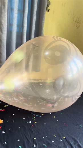 Orange balloon filled with small balloons explodes#shortsviral