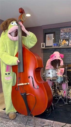 It’s Halloween week! Halloween is one of our favorite days of the year! We’re so excited to share our Monster Mash jam with you. 👻🎃 We can’t see through our costumes, but that’s the sacrifice you make for a Halloween reel! 🎸🥁 I’m a monster - do you know what my sis @mabelondrums is dressed as while drumming?!? We’ll be posting our Pocket Sister’s Halloween throwbacks throughout this week! 💜🧡🖤
