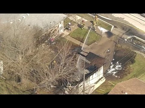 Macomb County garage fire injures 1, damages 2 homes