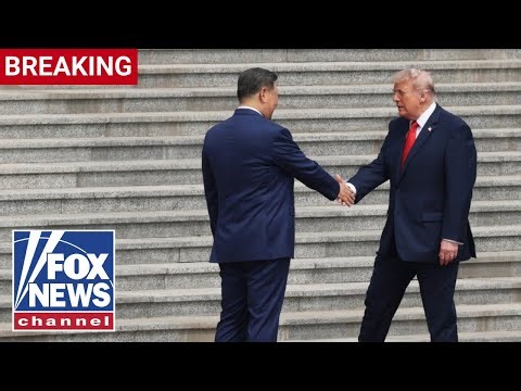 BREAKING: Trump shakes hands with Xi Jinping