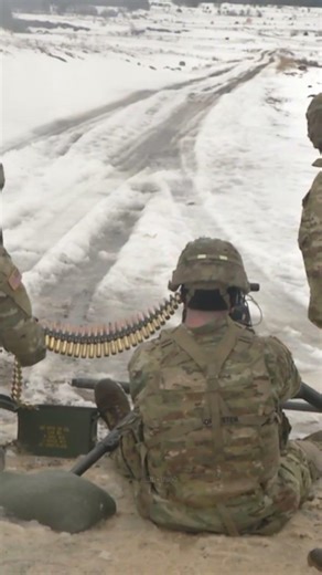 U.S. Marines practice shooting with an M2A1 machine gun