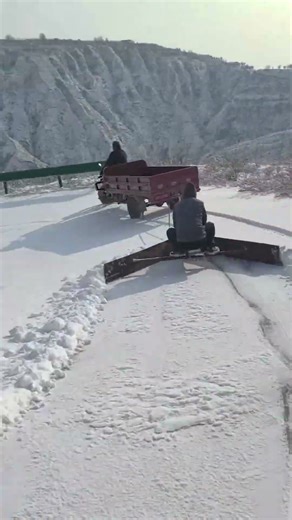 Ingenious Village Men: Clearing Snow With a Tricycle and a Homemade Plow