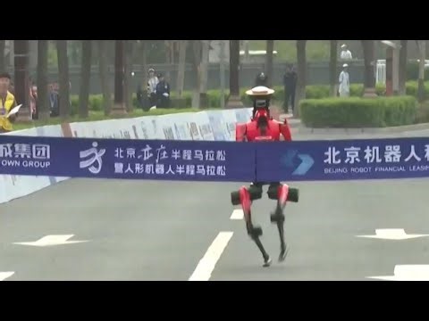 Video shows humanoid robot setting record in half-marathon in Beijing