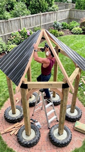 Backyard Makeover Idea: Tires Turned Into Flower Planters for a Garden Gazebo DIY