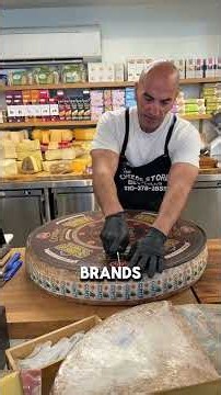 Opening a 65 pound wheel of Comte cheese #cheese #cheesemonger