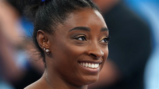 Simone Biles makes winning return after two-year break from gymnastics