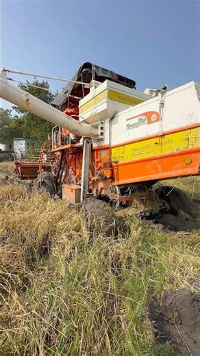 Kubota harvester stuck in mud #shorts #trending #tractor
