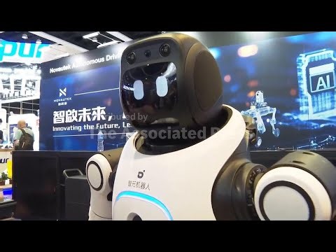 Humanoid robots show off their language and boxing skills