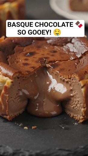🍫🔥 Rich, creamy & perfectly gooey Chocolate Basque Cheesecake! 🤤 Would you try a slice? 👇