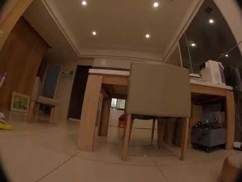 Corrupted glitch cinematic footage evolves into stop motion FPV drone flying dangerously inside livi