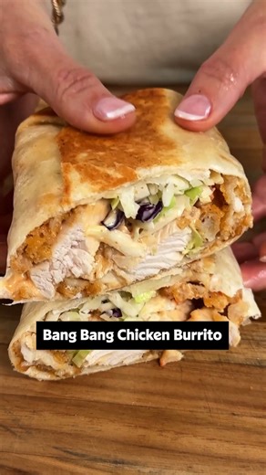 Bang Bang Chicken Burritos are EVERYTHING! 🌯🤤 They're a certified 12/12! Get the full recipe in the comments or keep reading. Ingredients: 1/2 cup mayonnaise 1/4 cup sweet chili sauce 2 tablespoons Sriracha 12 frozen crispy chicken strips 4 (10 to 12-inch) flour tortillas 2 cups coleslaw mix Directions: Stir mayonnaise, chili sauce, and Sriracha sauce together in a small bowl until well combined and set aside. Prepare chicken strips in the air fryer according to package directions and cut into