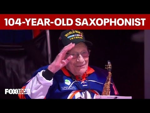 104-year-old WWII veteran performs saxophone national anthem at Islanders-Rangers game