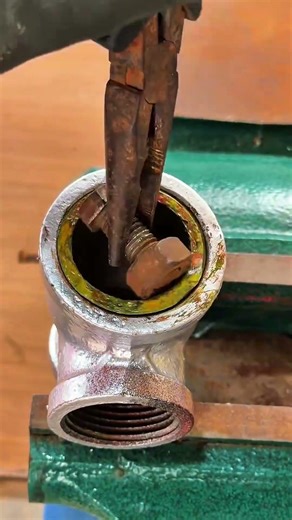 Unscreting a Broken Bolt in the Pipe