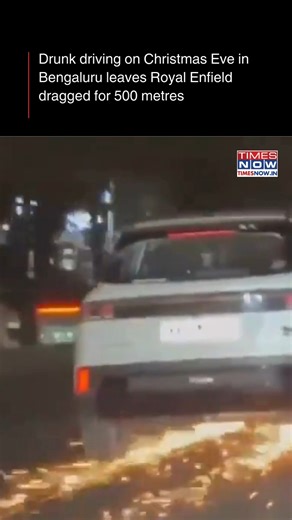 In a drunken driving case in Bengaluru, a car dragged a motorcycle for nearly half a kilometre after a chain collision on Christmas Eve, leaving the biker injured. The accused driver, Srinivasa KV, 38, was allegedly drunk, thrashed by locals and later handed over to police. #Bengaluru #DrunkDriving #ChristmasEve #RoadAccident #BreakingNews | TIMES NOW