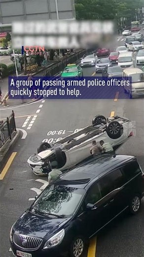 Watch: Passing soldiers rush to rescue after car overturns