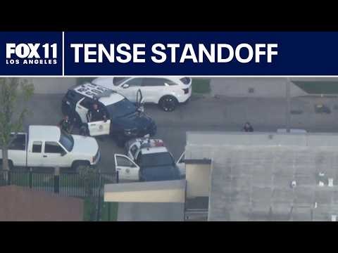 Standoff situation involving pursuit suspect