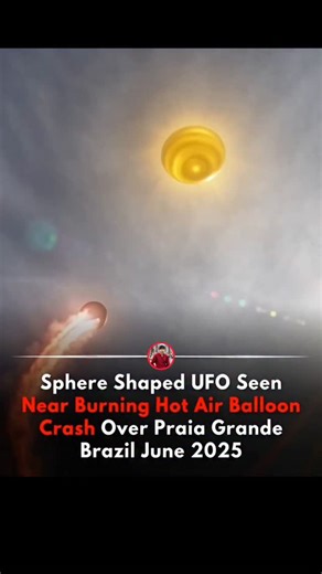 “Was This UFO Watching the Hot Air Balloon Crash… or CAUSED It?! 😳🛸🔥” A shocking moment was captured in the sky over Praia Grande, Brazil (June 2025) — and people can’t stop asking one terrifying question… WHAT was that glowing sphere?! 😨🛸 In the video, a hot air balloon appears to be burning mid-air 🔥🎈 while falling rapidly… but what makes this clip even more disturbing is the presence of a sphere-shaped object floating nearby — looking calm, steady, and almost… watching 👁️⚫ Some viewer