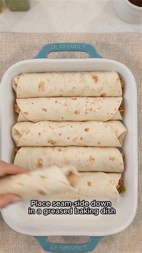 Creamiest Queso Chicken Enchilada Casserole