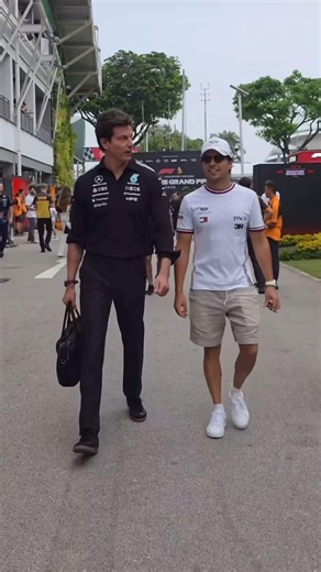 Toto Wolff & Sergio Perez arriving together in the Paddock