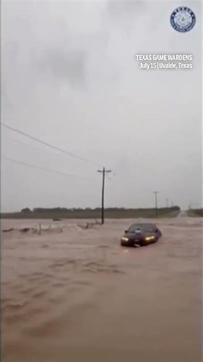 Texas flooding surges from huge rainstorms as rescuers pull people from rising waters