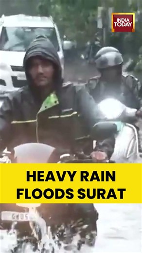 Surat Faces Severe Waterlogging After Heavy Downpour, Roads & Homes Submerged, Traffic Halts #flood