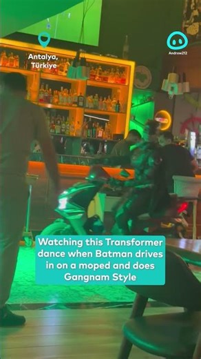 Transformer Dances While Batman Drives a Moped Inside a Bar || ViralHog Shorts