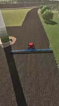 Harrowing a huge field in Farming Simulator