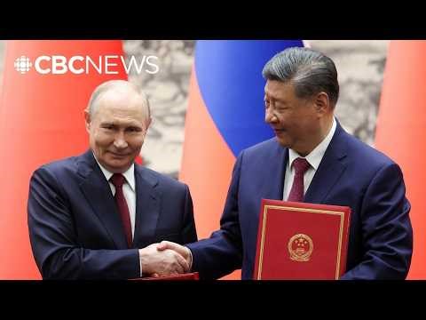 Xi strengthens trade deals with Russia as Putin visits China