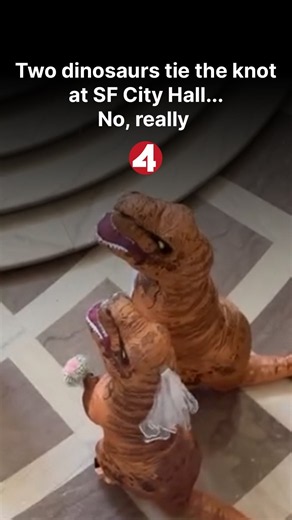 Two dinosaurs tie the knot at SF City Hall… No, really