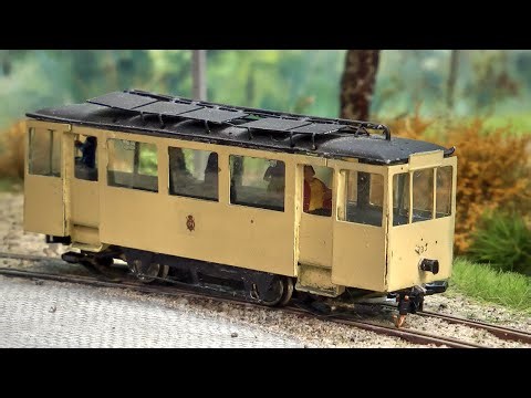 A special model railway layout in HO scale with two track gauges for tramways and freight transport