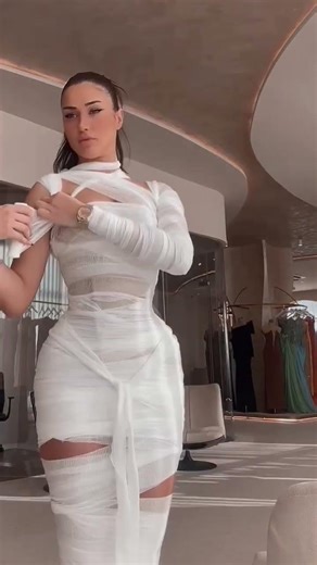 Share with a friend who would own the spotlight in this nude strapless mini corset gown! To order,