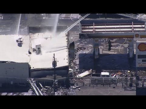 Aerial view shows aftermath of explosion at Denver gas station
