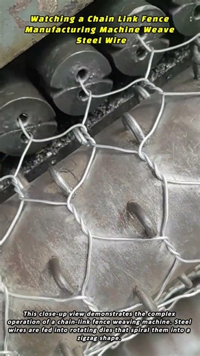 Watching a Chain Link Fence Manufacturing Machine Weave Steel Wire