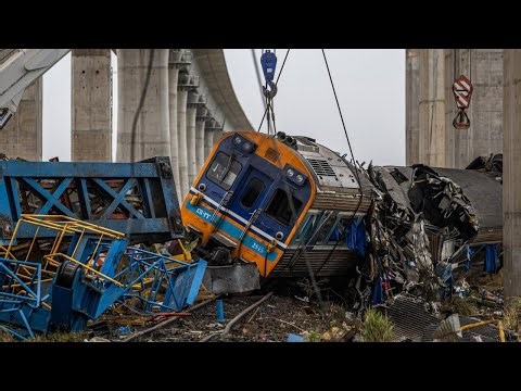Crane crushes parts of train in Thailand, killing at least 30 people, officials say