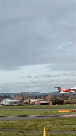 loganair E145 taking off from Exeter Airport for Newcastle