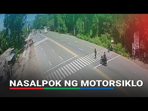 Babaeng tumatawid sa pedestrian lane nasalpok ng motorsiklo | ABS-CBN News