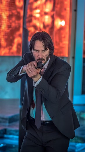 Why John Wick Flicks His Gun to Reload?