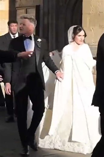 Gordon Ramsay and his model daughter Holly, 25, faced an unexpected flurry of attention from photographers as they arrived at Bath Abbey for her wedding to Olympic swimmer Adam Peaty - prompting a brief clash with security. The situation was swiftly resolved, allowing the focus to return to the joyful occasion. Congrats to the newlyweds! 🎉 #gordonramsay #wedding 📽️: Getty