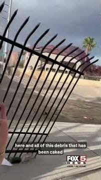Las Vegas flooding damages storm channel fence