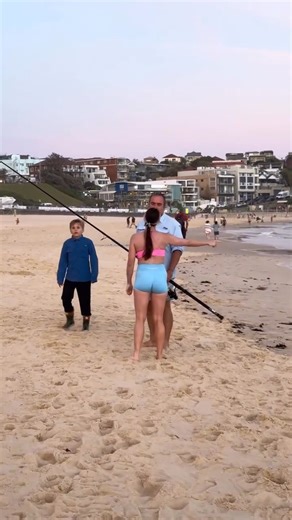 A controversial animal rights activist is facing backlash after accosting a father and son who were on a day out at Sydney’s most famous beach. | News.com.au