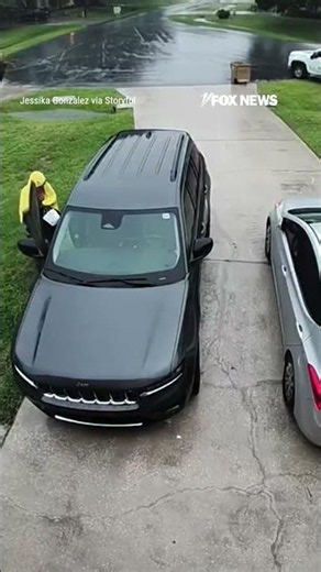 WATCH: Woman has TERRIFYING close call as lightning strikes just feet away from her #scary #shorts