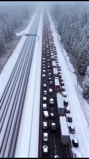 Heavy snow turned Interstate 80 into a frozen standstill as dangerous winter conditions forced a full closure between Truckee and the Nevada state line. Icy roads caused multiple vehicles to spin out, slide off the highway, or become stranded after drivers stopped to help others. Traffic was completely immobilized as snowfall intensified and visibility dropped, leaving motorists stuck for hours in extreme winter conditions. This is winter travel at its most unforgiving—where one mistake can shut