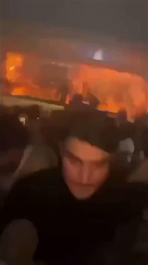 Terrifying footage from inside burning Swiss bar