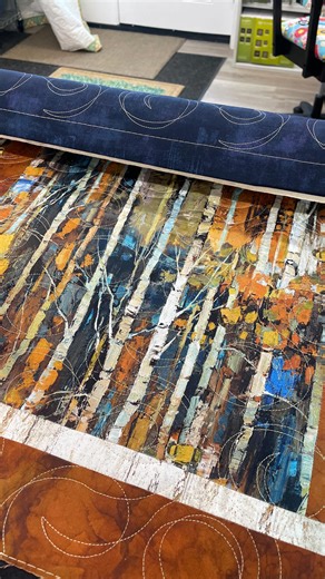 Snowbird Quilts on Instagram: "A sweet little birch-tree wall hanging, framed beautifully and stitched with Wind Swirls by Dave Dennis. This one is all finished up and headed back to Harrisonburg on Thursday. 🌲✨ Hashtags: #SnowbirdQuilts #LongarmQuilting #BirchTreeQuilt #WallHangingQuilt"