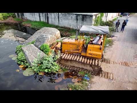 BEST Full video Earthmoving truck fill in areas where there is no flat ground and push it with dozer