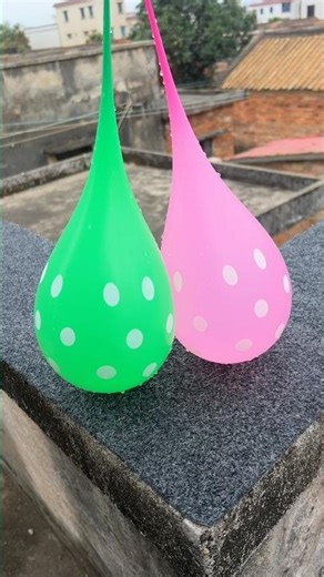 Experiment: Will a water balloon explode if it rolls down a tall building? 💥🎈 #satisfying