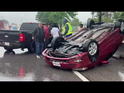 HOLD:Car Flips on Freeway as Severe Weather Hits Houston