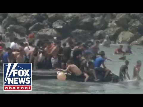 BREAKING: Migrants storm city border as national emergency requested