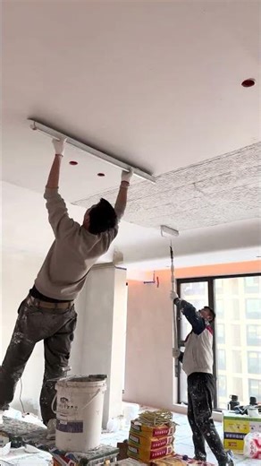Perfectly Smooth Ceilings: Roller Application and Wide Trowel Skim Coating